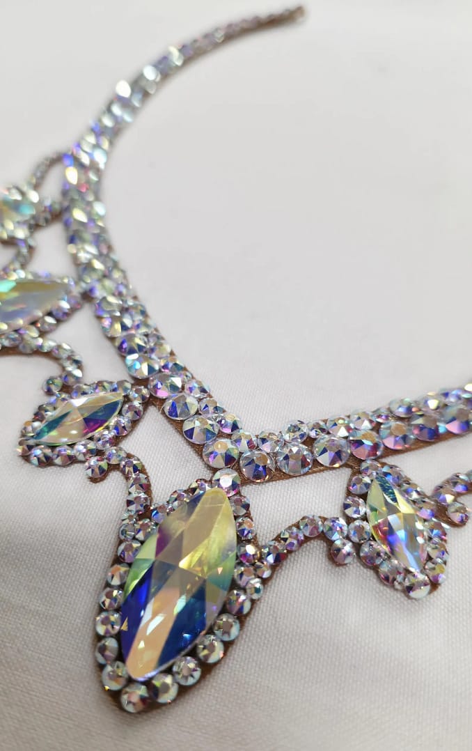 Close-up of Crystal AB stones on Luminous ballroom necklace with clear color and high-reflection sparkle.