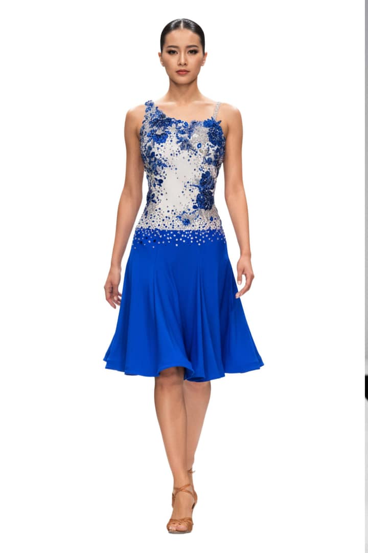 Manon Latin dress — full view — full-body view of model wearing the blue and white Manon dress