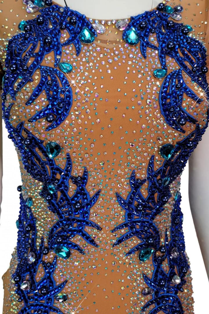 Narnia Latin Dress – stonework close-up of royal blue appliqué and crystal embellishment on nude mesh