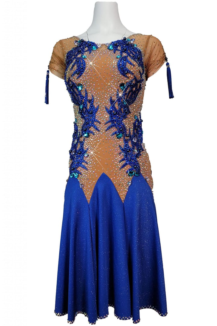 Narnia Latin Dress – front view - in mannequin - with nude mesh, royal blue appliqué and crystal detailing