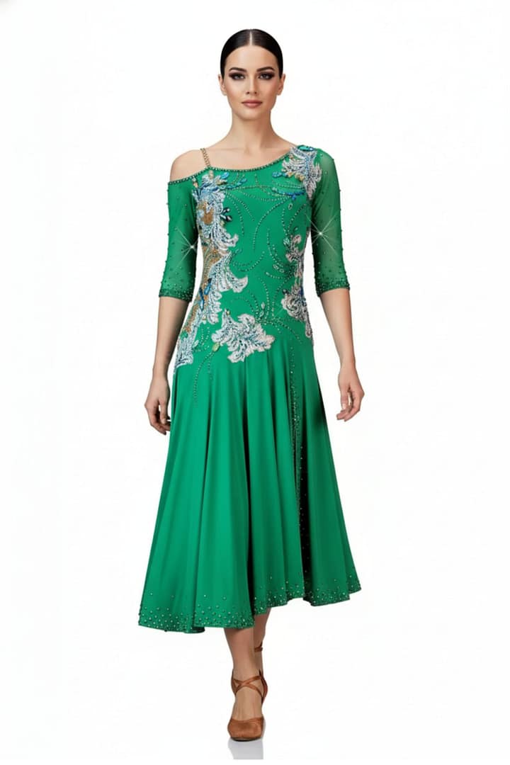 Carmen Latin dress — front view — Bright emerald green Latin dress with three-quarter length sheer sleeves, an off-the-shoulder strap detail, and a heavily stoned bodice with flowing white and blue floral appliqués.