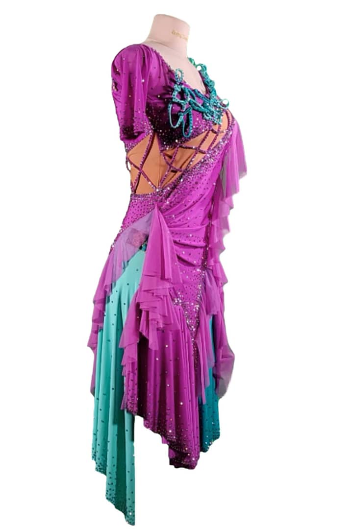 Bonel Latin Dress — side view — illustrating the flattering silhouette and multi-layered ruffled fringe