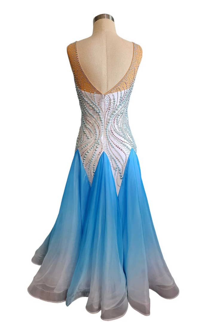 Cyra Ballroom gown. - back view - Deep V-back, crystal bodice, full blue ombre skirt volume.