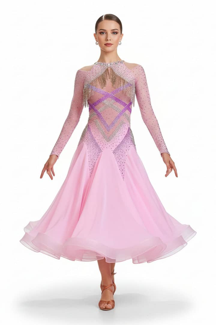 Labana ballroom gown — front view — Long-sleeved, pale pink Standard gown with a sheer mesh yoke, detailed geometric stoning in purple and AB crystals, and silver beaded fringe across the chest and shoulders.