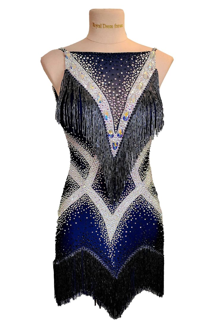 Arlan Latin dress — front view — mannequin — deep navy blue dress with striking white crystal chevrons and black beaded fringe.