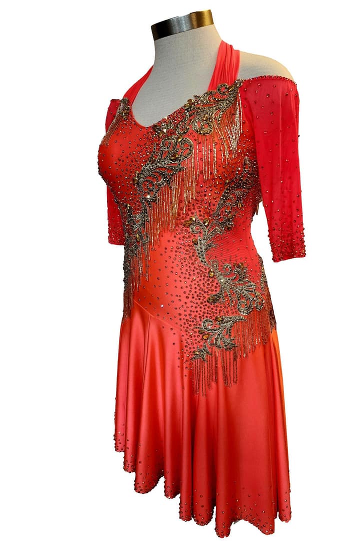 Crush Latin dress — 3/4 view — showcasing the rhinestone lattice on the bodice and the high-low hemline of the skirt.