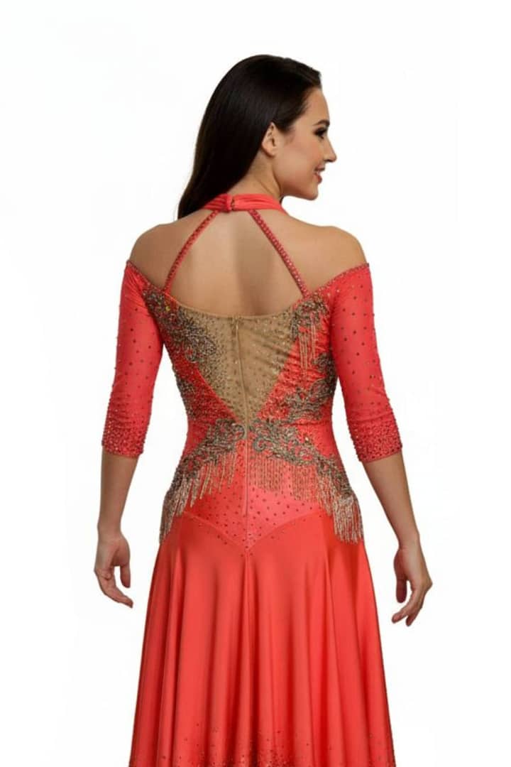 Crush Latin dress — back view — open back with nude chiffon floats and multi-layered orange fringe.