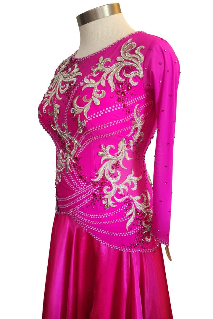 Juno Ballroom gown — 3/4 view — long sleeve magenta dress with mesh inserts and crystal beadwork