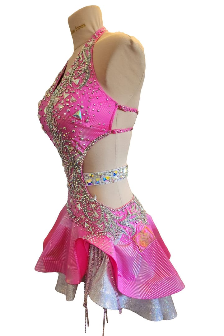 Close-up of Radiant Motion bodice with crystal swirl appliqué and geometric stones