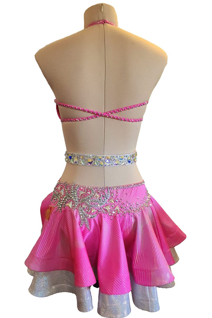 Back view of pink Latin dress with open back and crystal strap detailing