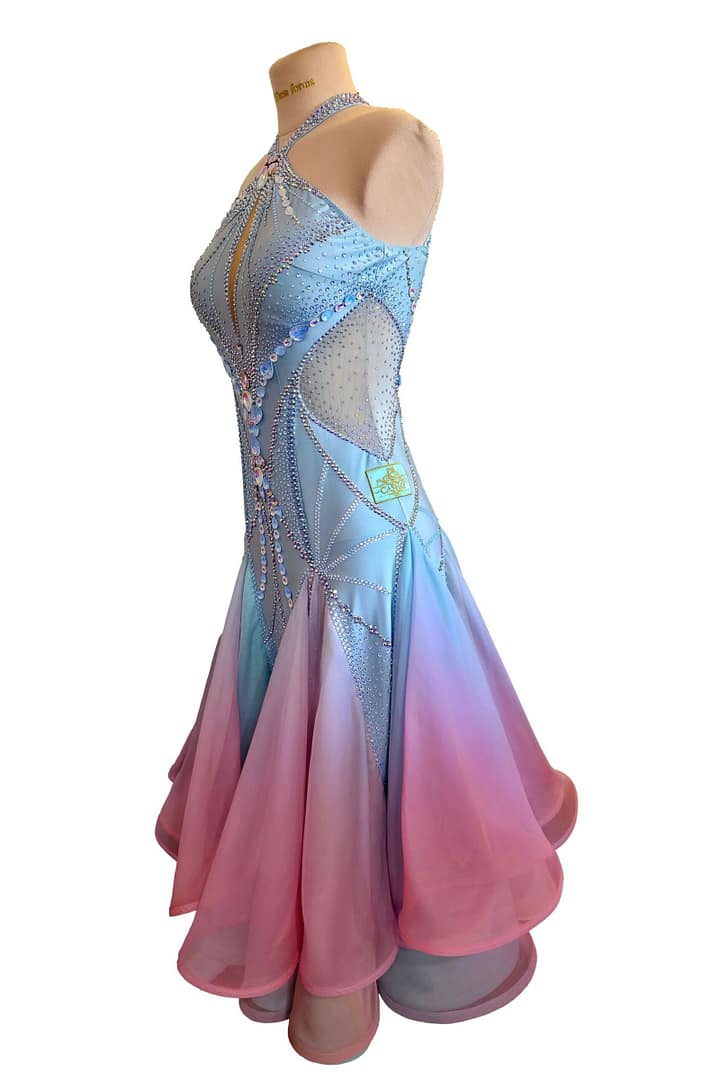 Layered chiffon skirt detail of ballroom gown with flowing pastel panels designed for smooth Standard and Smooth movement.