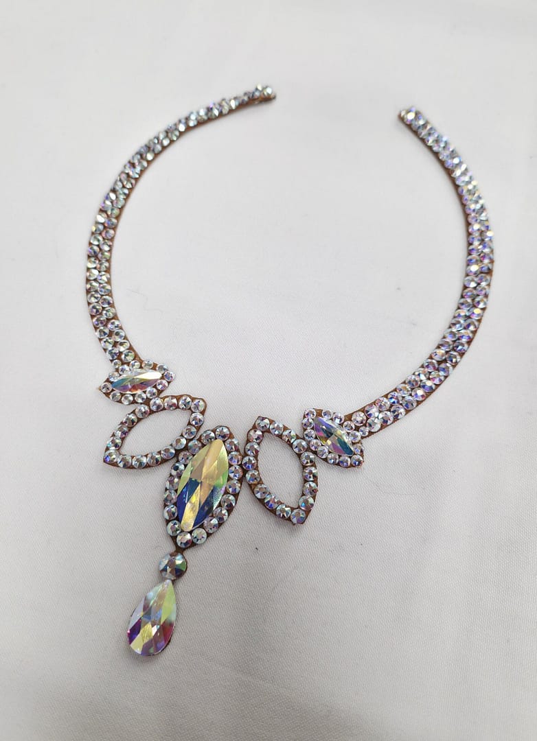 Full design view of elegant crystal statement necklace with balanced crystal arrangement for competition wear.