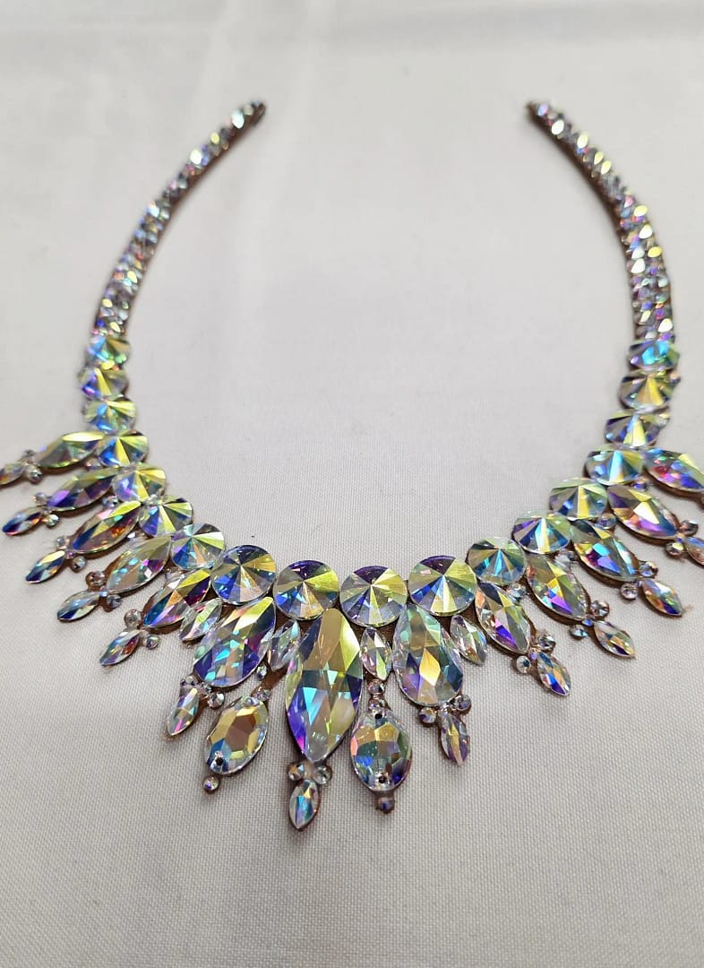 Full view of a large stones crystal necklace for ballroom dancing, featuring layered AB stones and dramatic silhouette.