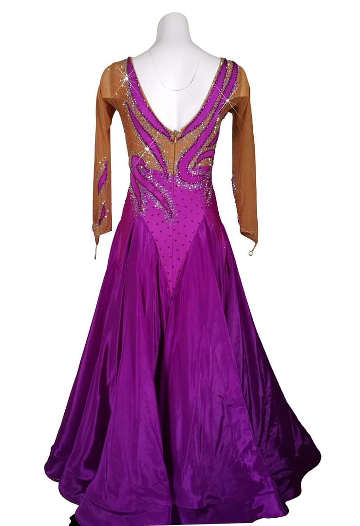 Majestic Violet ballroom dress back view featuring deep V open back, sheer sleeves with crystals, and full flowing purple skirt
