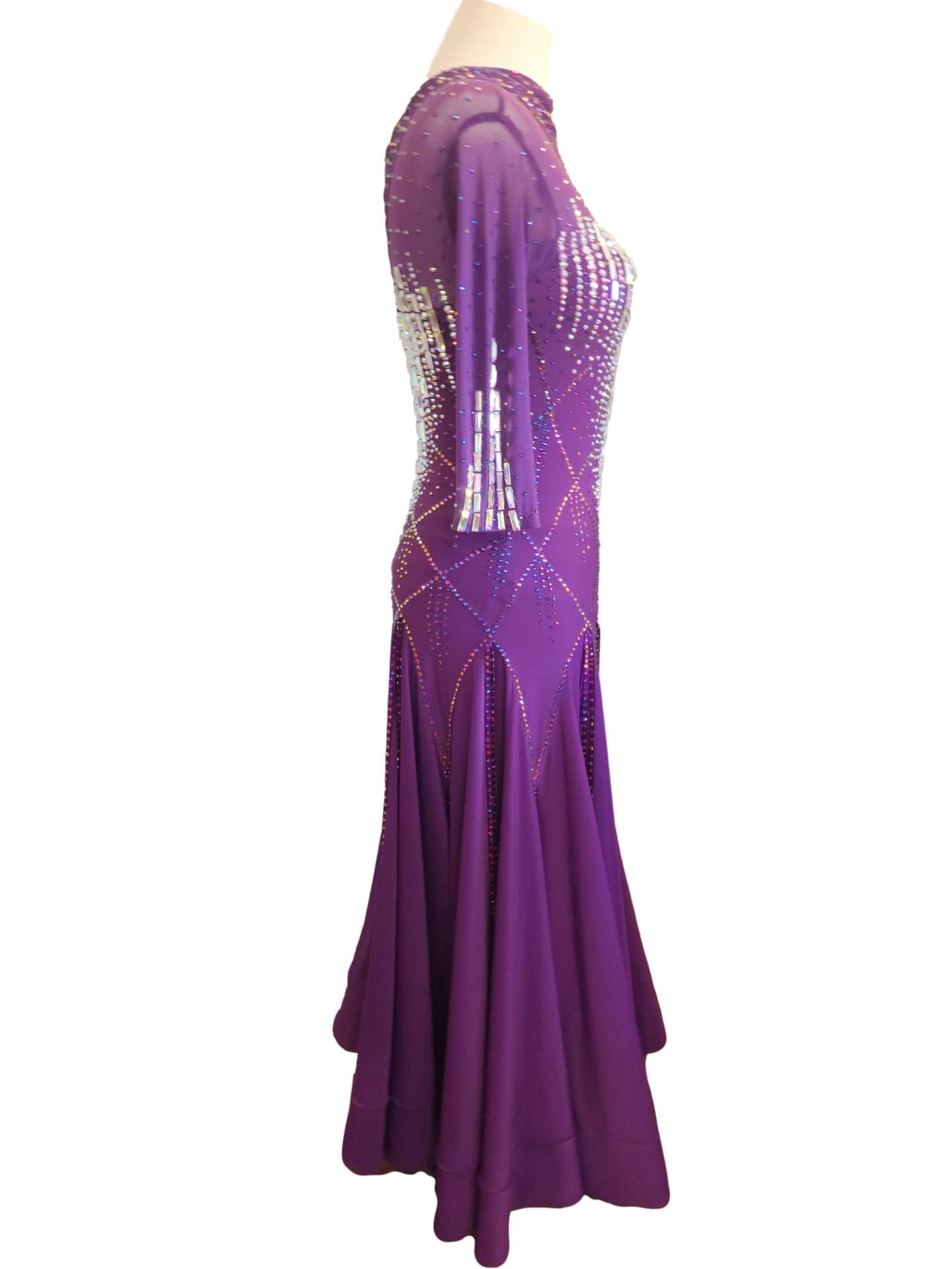Purple ballroom gown — side view — high neck, vertical crystal bodice, full-length A-line skirt with panels.
