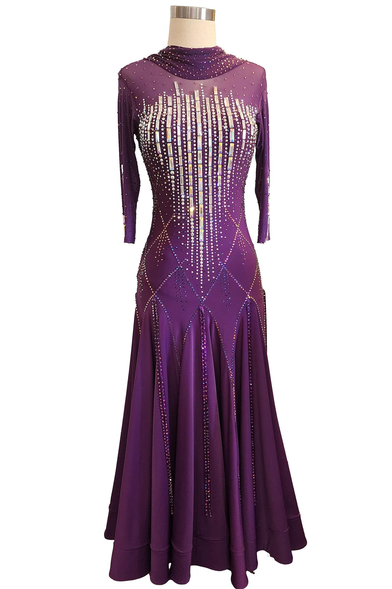 Purple ballroom gown — front view — high neck, long sleeves, vertical crystal bodice, and full length skirt.