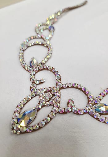 Crystal ballroom necklace displayed on a black jewelry bust