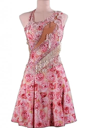 Usha Ballroom Dress – in mannequin – pink rose print with crystal fringe bodice and asymmetrical cut-out detail