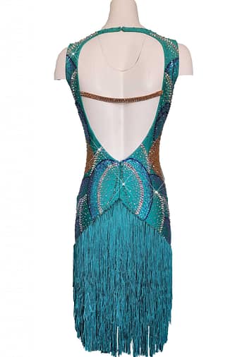 Undina Latin Dress — back view — mannequin displaying a deep scooped back with a securing crystal strap and full teal fringe skirt