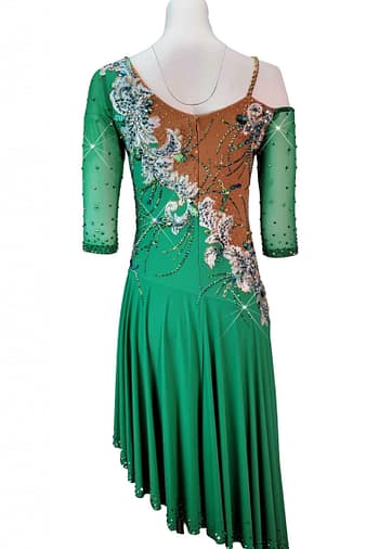 Carmen Latin dress — back view — nude mesh paneling and the continuation of the white and blue floral appliqué motif across the back bodice.