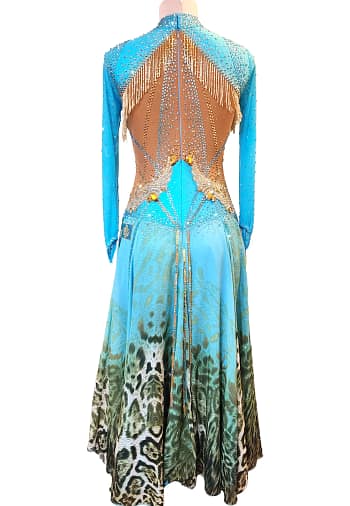 Hadley ballroom gown — back view — open back with heavy crystals and gold fringe accents