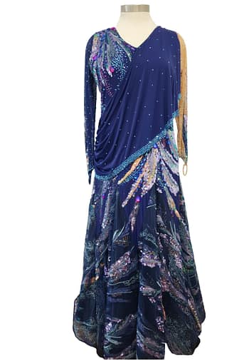 Back view of Royal Horizon ballroom dress featuring deep V-back, crystal embellishments, and layered printed chiffon skirt