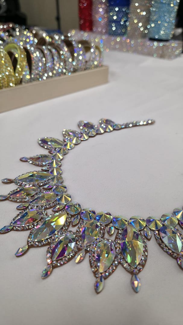 Side angle view of oversized crystal ballroom competition necklace