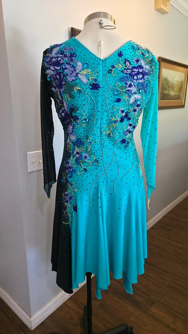 Electric Bloom ballroom dress full back view with teal fabric and crystal embellishment design