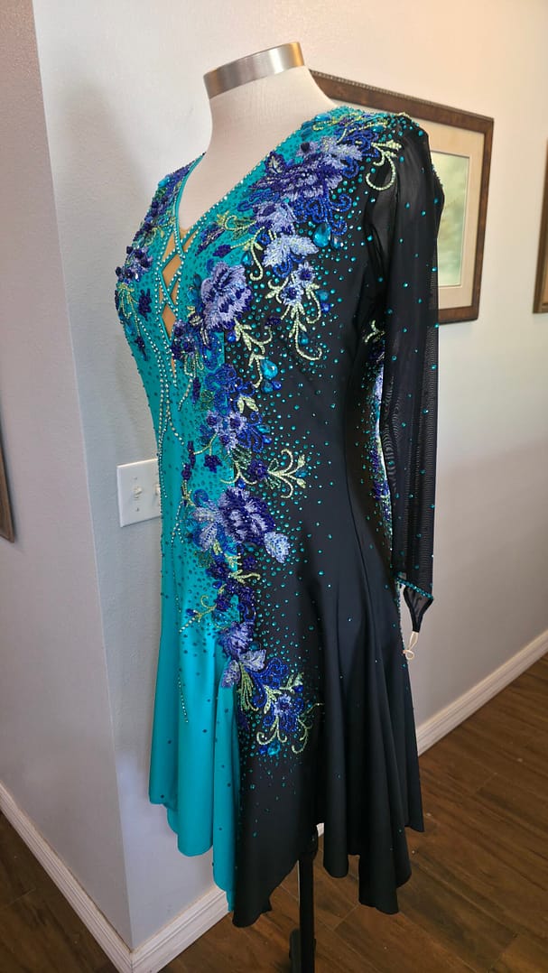 Electric Bloom ballroom dress side view with sheer black sleeve and floral crystal design