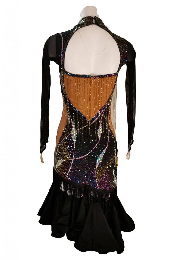 Mia Latin dress — back view — open back design with nude mesh lining, crystal fringe, and long sleeves