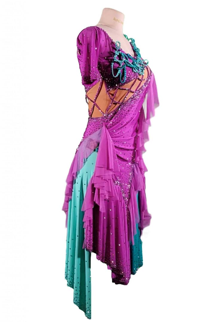 Bonel Latin Dress — side view — illustrating the flattering silhouette and multi-layered ruffled fringe