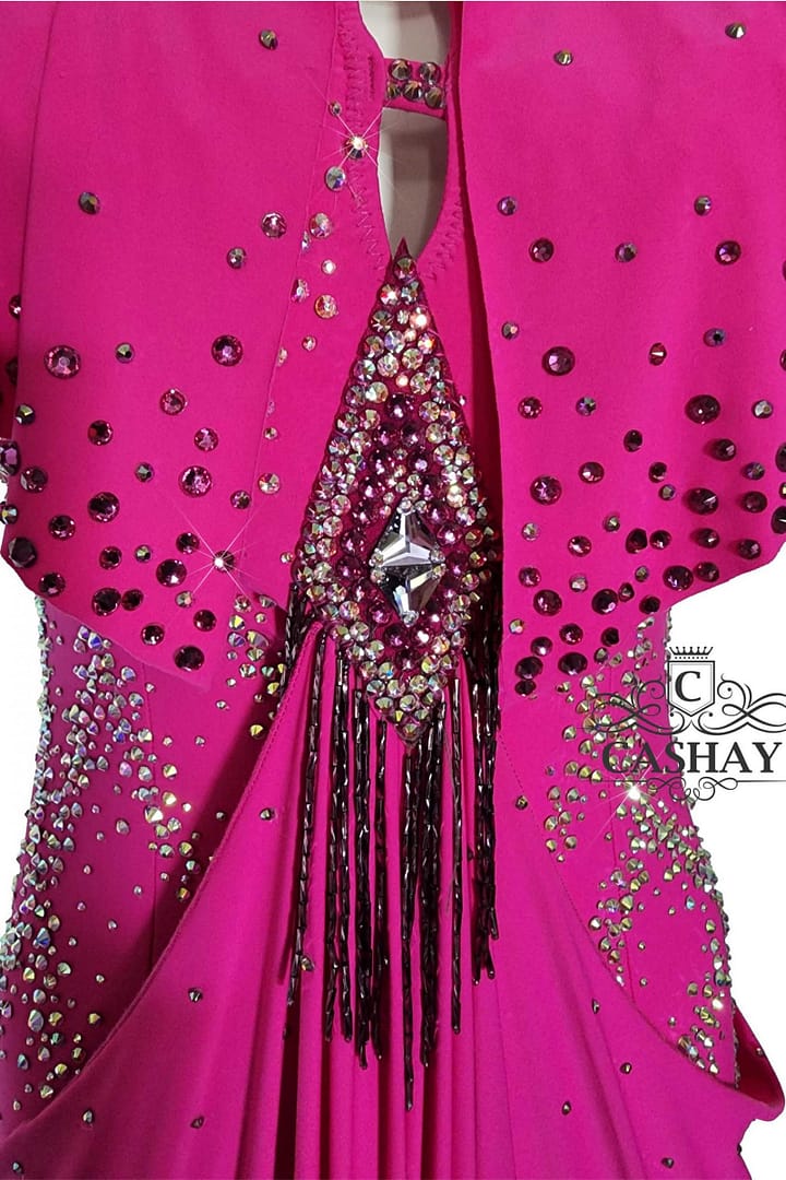 Zera Latin dress — stonework close‑up — dense arrangement of fuchsia and iridescent crystal AB stones