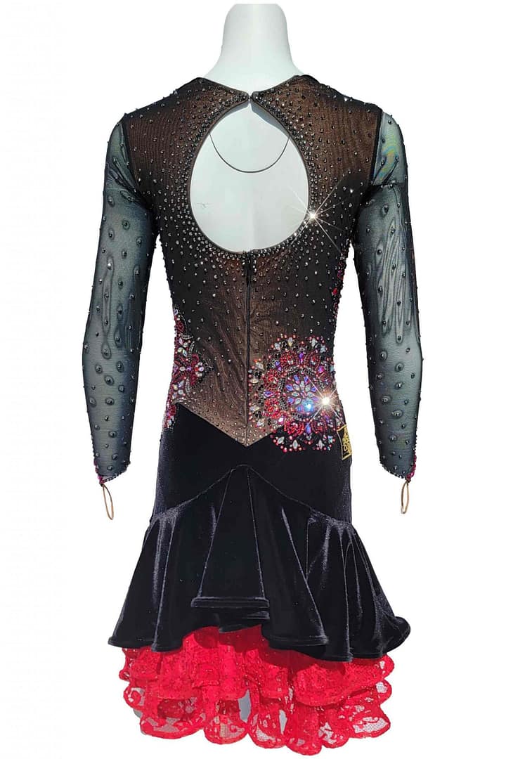 Fawn Latin Dress — back view — mannequin displaying a large circular keyhole opening, full-coverage sheer sleeves, and a red lace underskirt