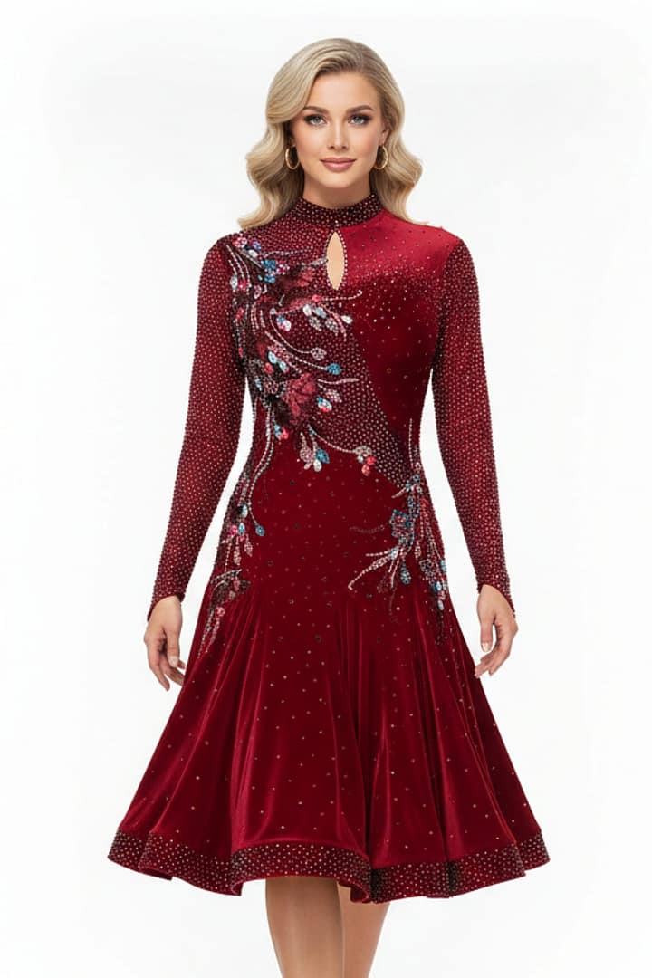 Talia Latin dress — front view — long sleeves, pleated velvet skirt, and diagonal red appliqué embellishment.