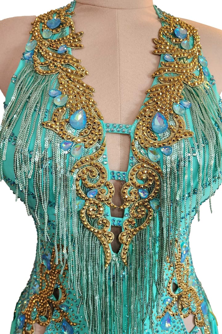Ashcroft Latin Dress - bodice detail - Gold appliqué and teal fringe, with central keyhole cutout and crystals.
