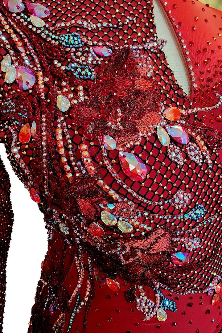 Talia Latin dress — stonework close‑up - keyhole cutout, and rhinestone scatter on the smooth velvet side panel.