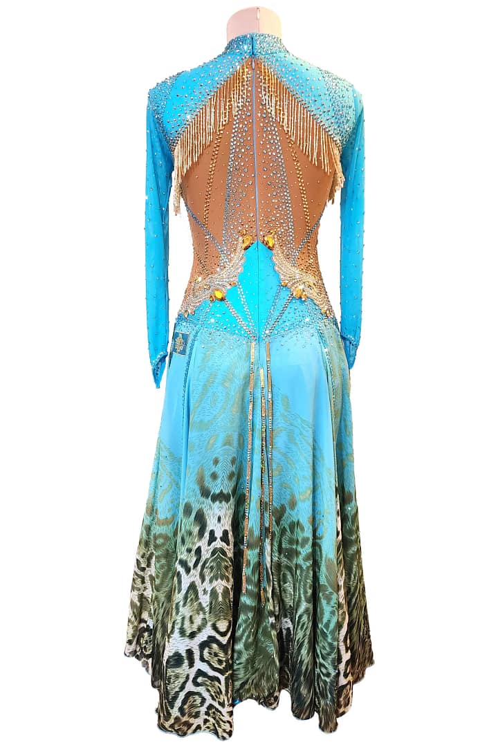 Hadley ballroom gown — back view — open back with heavy crystals and gold fringe accents