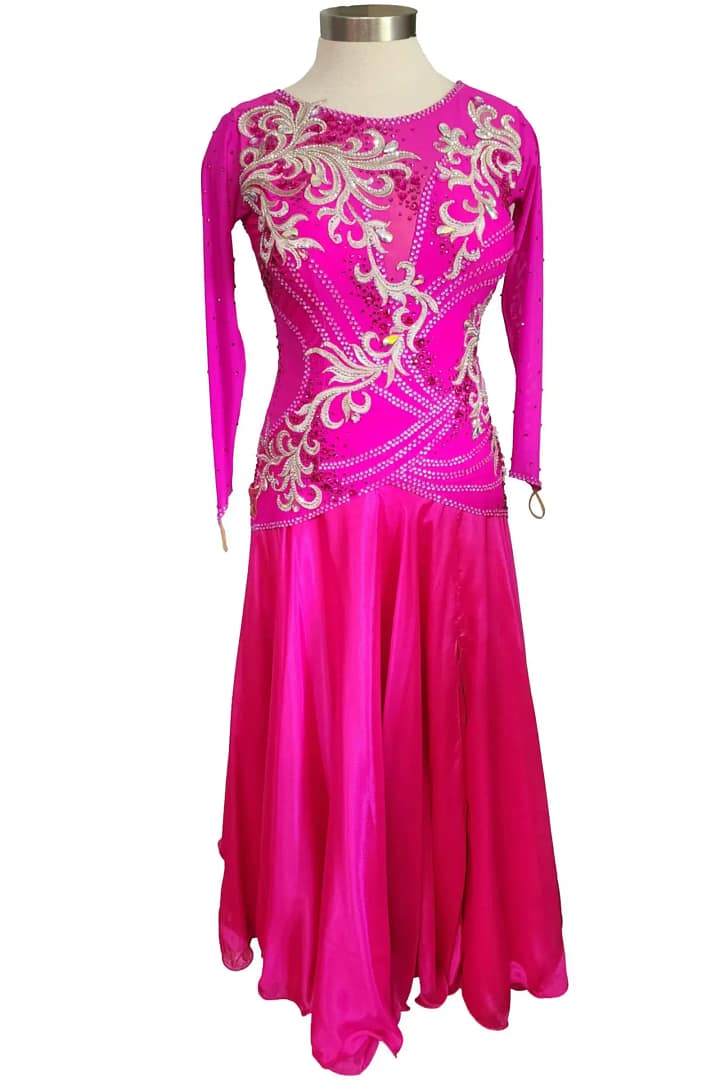 Juno Ballroom gown —front view - in mannequin — A-line standard dress with full skirt and densely embellished long-sleeved bodice