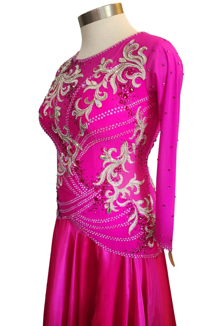 Juno Ballroom gown — 3/4 view — long sleeve magenta dress with mesh inserts and crystal beadwork