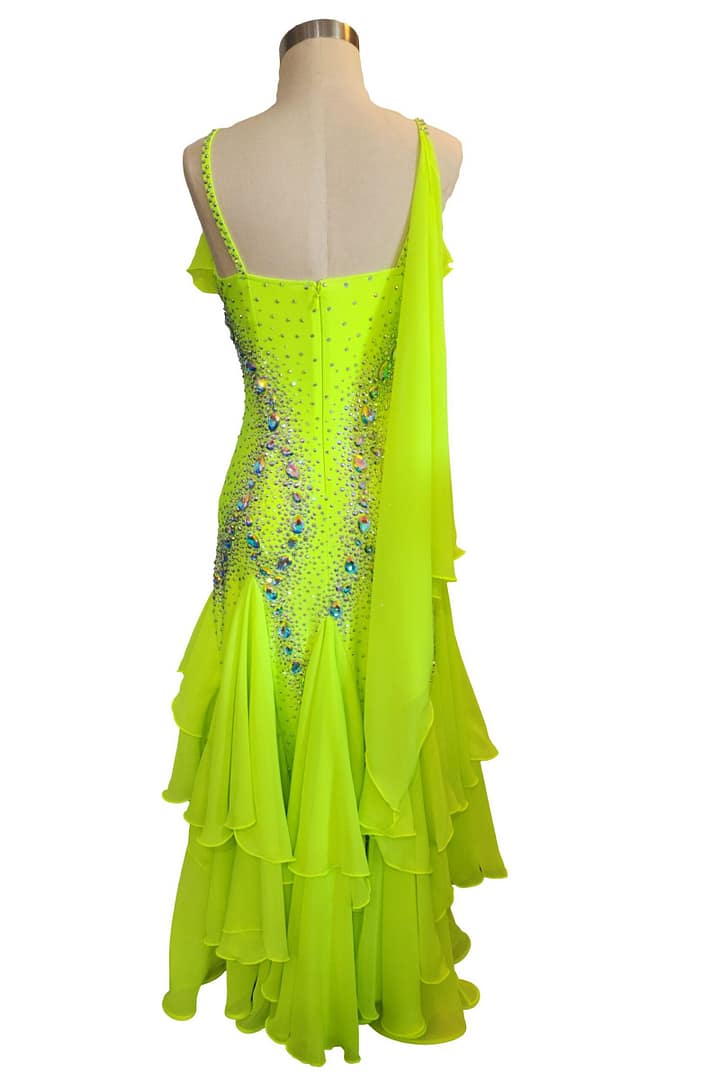 Back view of Electric Citrine ballroom gown with layered chiffon godets and elegant drape