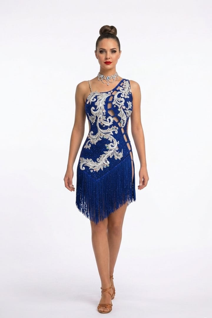 model wearing the Aurora Royale sapphire blue Latin dress with crystal embellishments and dramatic fringe.
